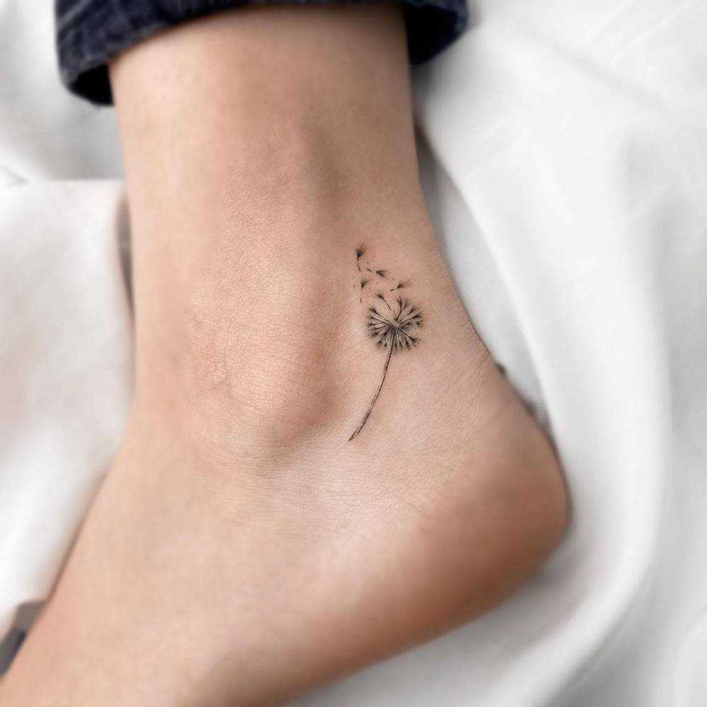 Tatuaż dmuchawiec jako symbol transformacji